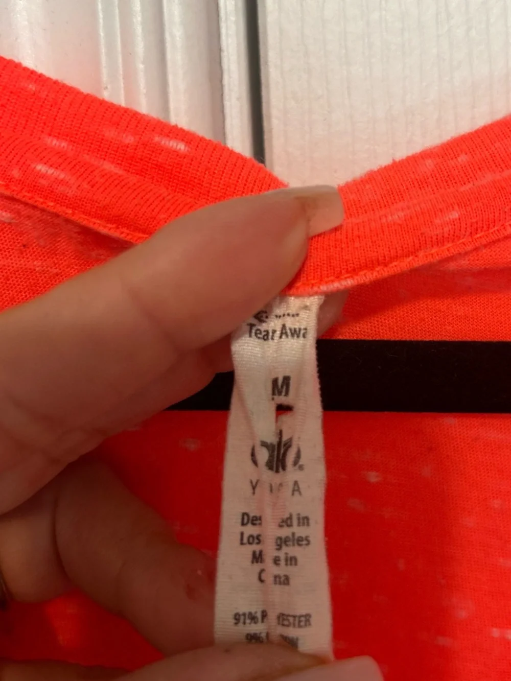 Alo Neon Coral V-Neck Short Sleeve Tee - Picture 4 of 4